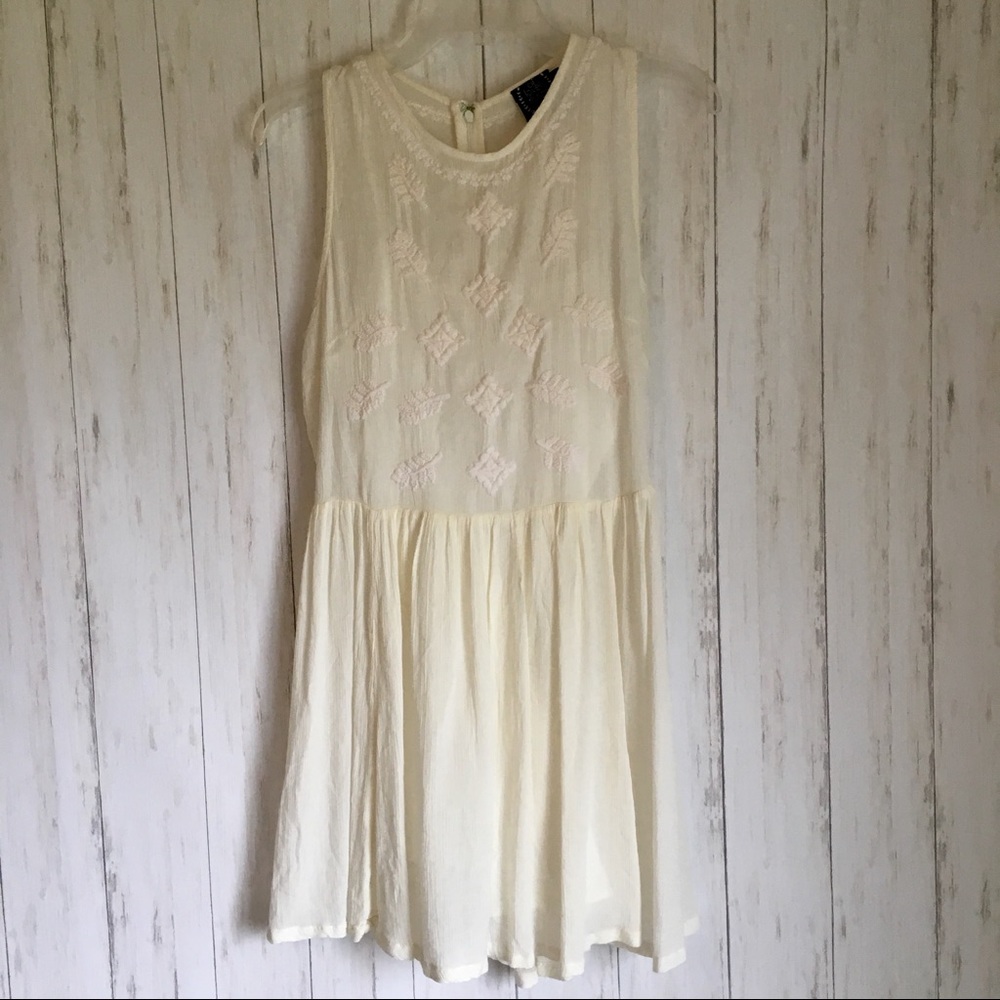 Elegant Cream Sleeveless Dress